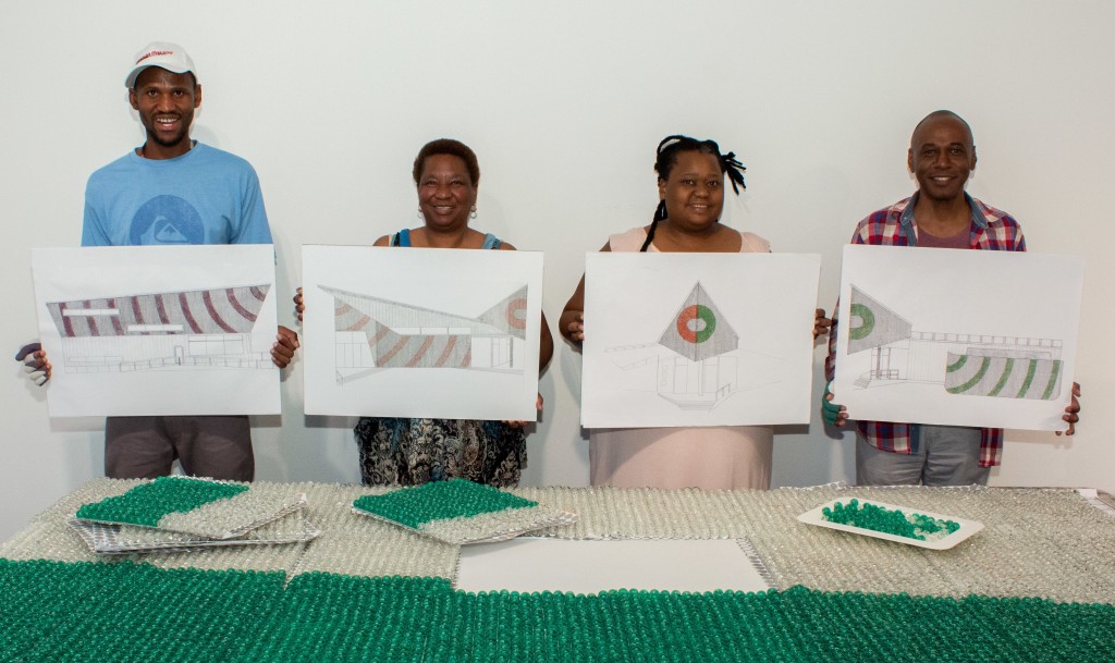 Artist Selven O'Keefe Jarmon (far right) with South African beaders. Photo by Juan Islas.