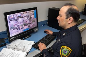 Officer Beserra monitoring cameras